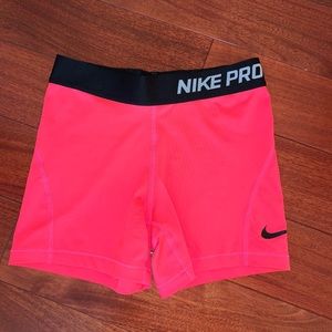 Girls size medium pink Nike pros